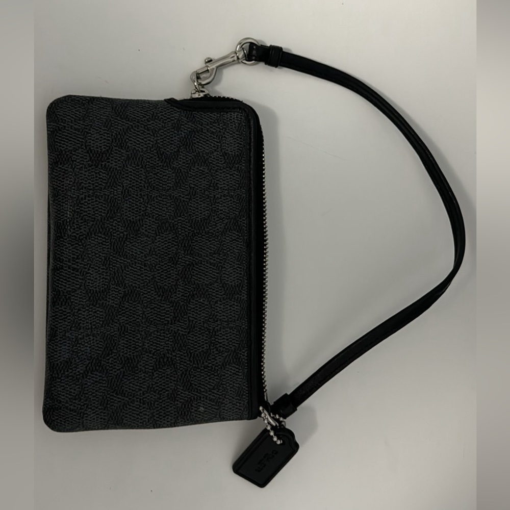 Coach wristlet. Never used. New